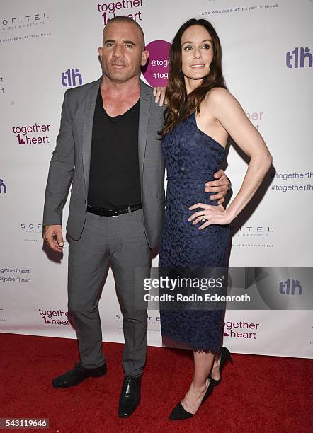 Actor Dominic Purcell and actress Sarah Wayne Callies arrive at together1heart launch party hosted by AnnaLynne McCord at Sofitel Hotel on June 25,...
