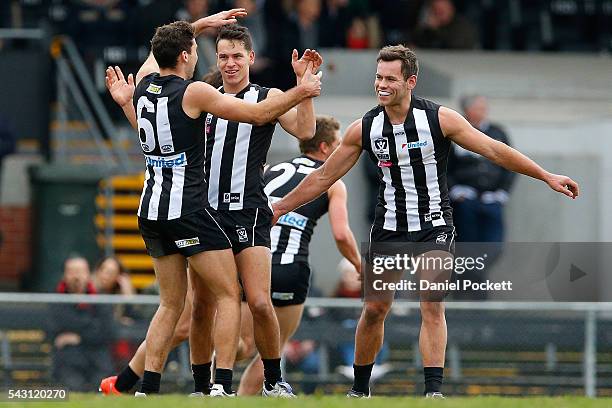 Angelo Rambaldi of the Magpies celebrates after kicking a goal during the round 12 VFL match between the Collingwood Magpies and the Richmond Tigers...