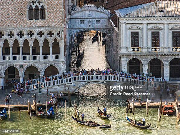 elevated view of venice italy, showing the canal with the bridge of sighs over it. - castello stockfoto's en -beelden