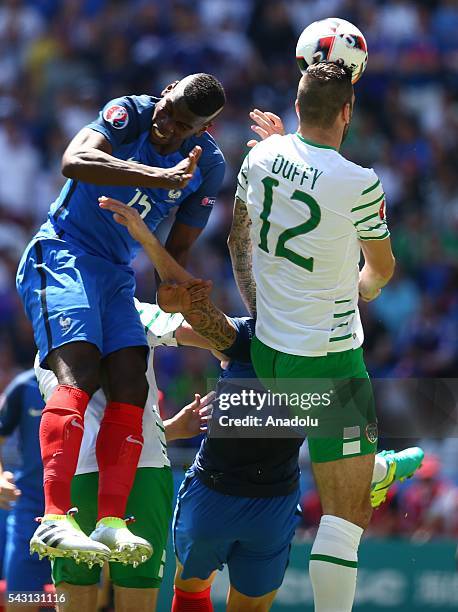 Paul Pogba of France in action against Shane Duffy of Ireland during the UEFA Euro 2016 Round of 16 football match between France and Ireland at the...