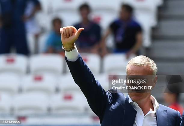 France's coach Didier Deschamps waves prior to the Euro 2016 round of 16 football match between France and Republic of Ireland at the Parc Olympique...