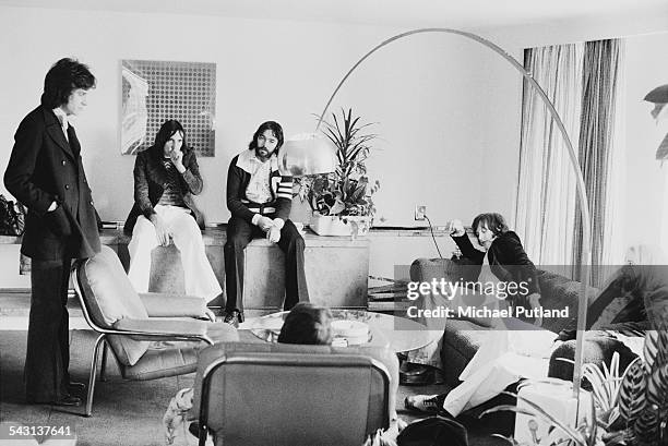 English rock group The Kinks, at a record company office in London, 11th April 1975. Left to right: singer Ray Davies, drummer Mick Avory, bassist...