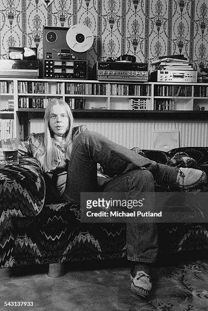 English composer and keyboard player Rick Wakeman, 9th April 1975. On a shelf behind him is a Teac reel-to-reel tape recorder.