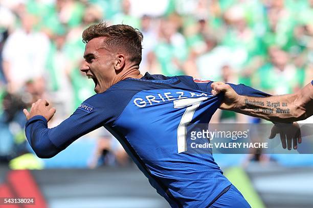 France's forward Antoine Griezmann celebrates scoring a goal during the Euro 2016 round of 16 football match between France and Republic of Ireland...