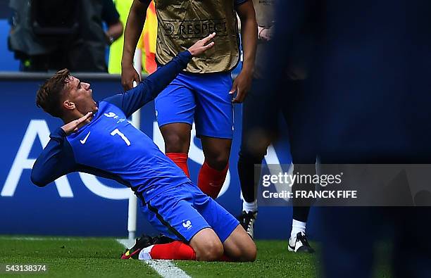 France's forward Antoine Griezmann celebrates after scoring during the Euro 2016 round of 16 football match between France and Republic of Ireland at...