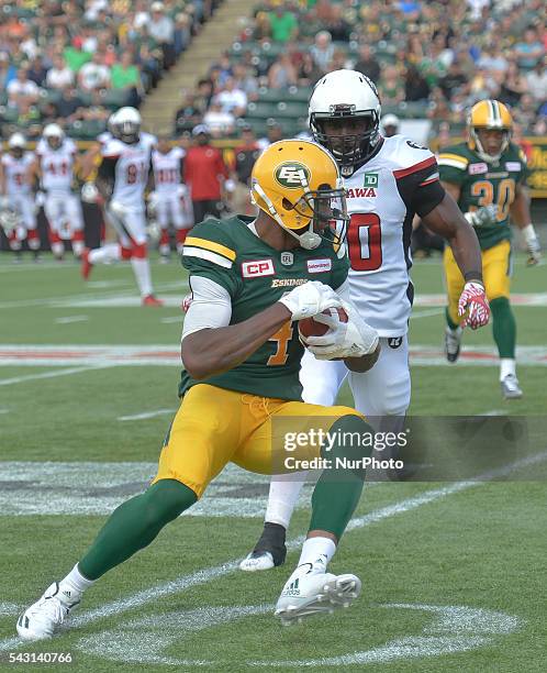 Edmonton's Adarius Bowman in action, challenged by Ottawa's Malik Jackson, during CFL game Edmonton Eskimos vs Ottawa Redblacks, at The Brick Field...