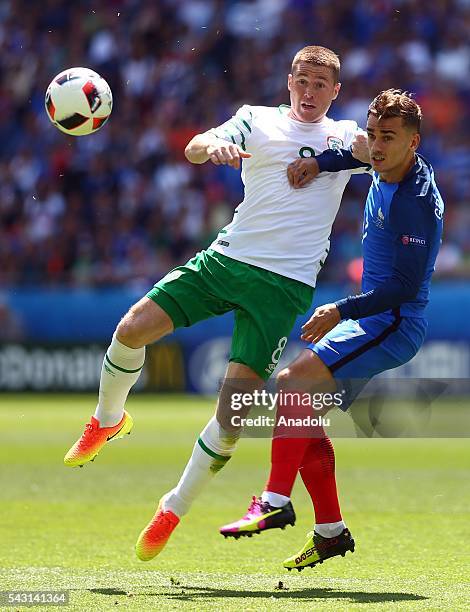 Antoine Griezmann of France vies withJames McCarthy of Ireland during the UEFA Euro 2016 Round of 16 football match between France and Ireland at the...