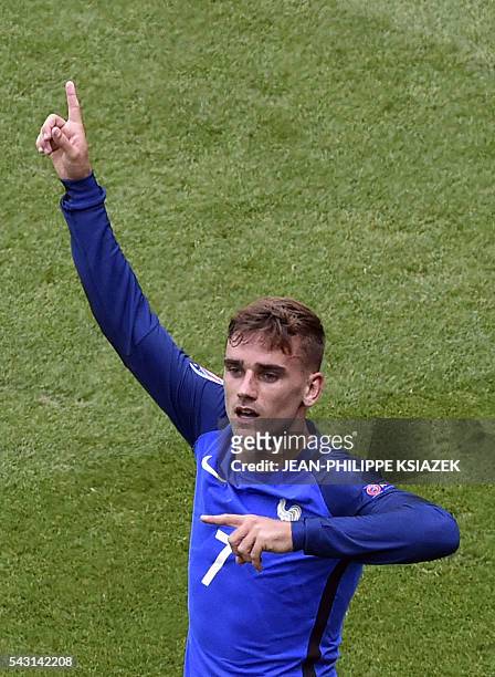 France's forward Antoine Griezmann celebrates scoring a second goal during the Euro 2016 round of 16 football match between France and Republic of...