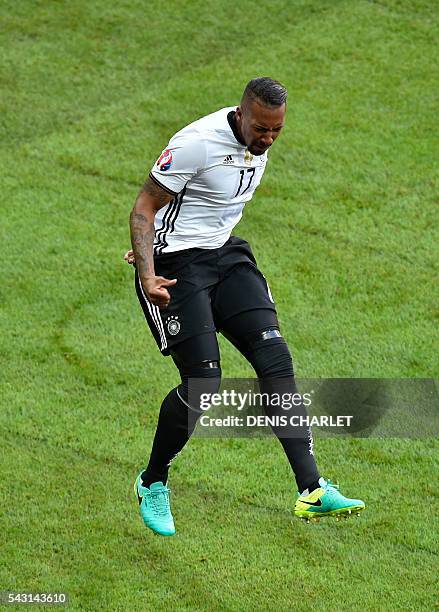 Germany's defender Jerome Boateng celebrates after scoring during the Euro 2016 round of 16 football match between Germany and Slovakia at the...