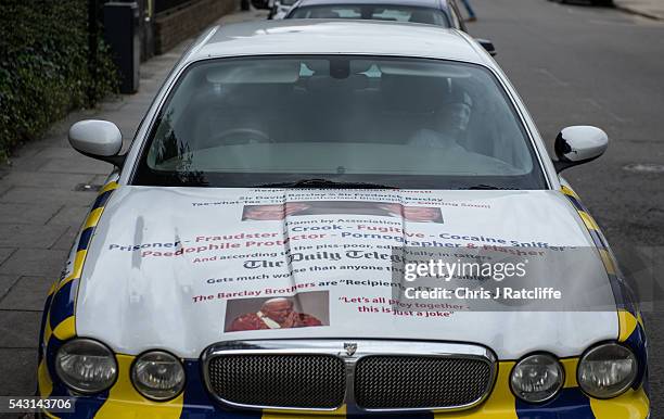 Car is parked across the road from Boris Johnson's London home with protest statements about the Barclay brothers written on it on June 24, 2016 in...