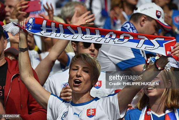 Slovakia supporter waves a scarf during Euro 2016 round of 16 football match between Germany and Slovakia at the Pierre-Mauroy stadium in...