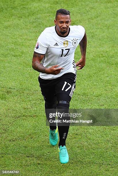 Jerome Boateng of Germany celebrates scoring the opening goal during the UEFA EURO 2016 round of 16 match between Germany and Slovakia at Stade...