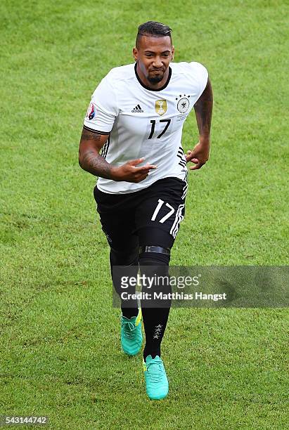 Jerome Boateng of Germany celebrates scoring the opening goal during the UEFA EURO 2016 round of 16 match between Germany and Slovakia at Stade...