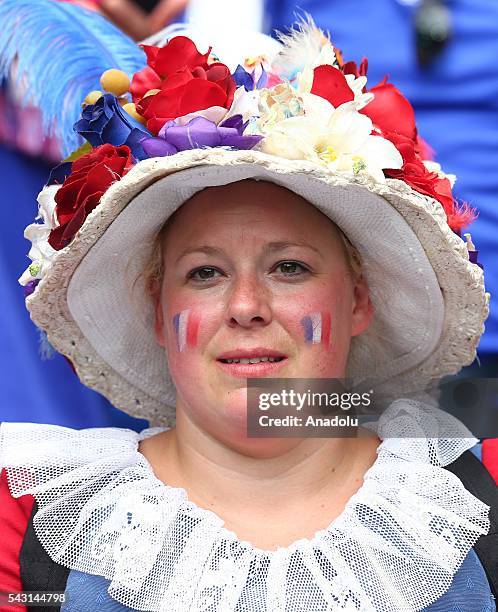 French fan enjoys the atmosphere during the UEFA Euro 2016 Round of 16 football match between France and Ireland at the Stade de Lyon in Lyon, France...