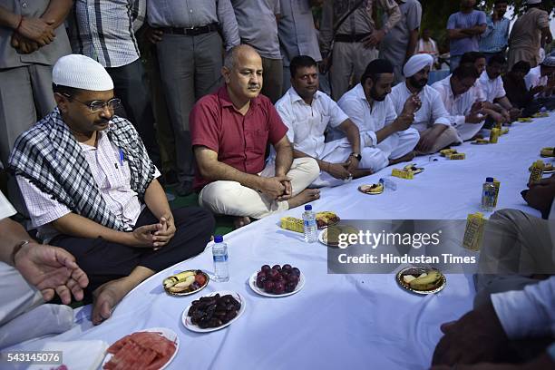 Delhi Chief Minister Arvind Kejriwal and Deputy Chief Minister Manish Sisodia along with party members host an Iftar party at Vidhan Sabha on June...
