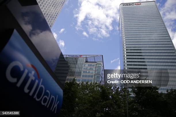 The offices of Citibank, Bank of America, and HSBC are pictured in the Canary Wharf financial district of east London on June 26, 2016. - British...