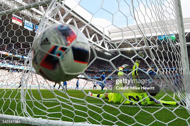 Matus Kozacik of Slovakia dives in vain as Jerome Boateng of Germany scores the opening goal during the UEFA EURO 2016 round of 16 match between...