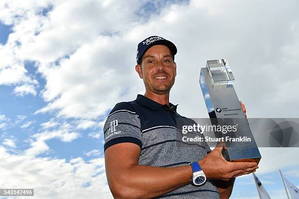 Henrik Stenson of Sweden poses with the trophy following his 3 shot victory during the final round of the BMW International Open at Gut Larchenhof on...