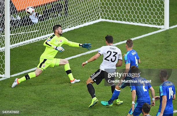 Mario Gomez of Germany scores his team's second goal during the UEFA EURO 2016 round of 16 match between Germany and Slovakia at Stade Pierre-Mauroy...