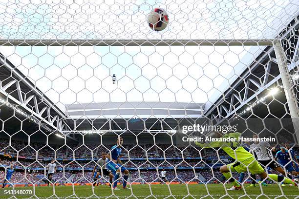 Mario Gomez of Germany scores his team's second goal past Matus Kozacik of Slovakia during the UEFA EURO 2016 round of 16 match between Germany and...