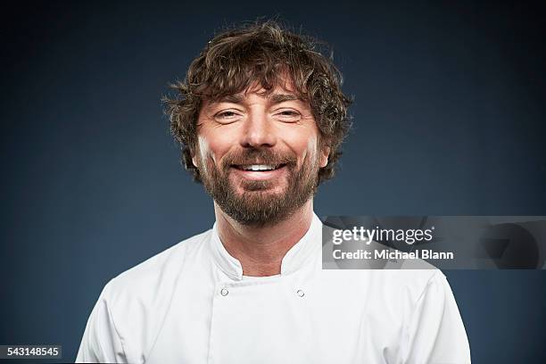 head and shoulders portrait - chef's whites stock-fotos und bilder