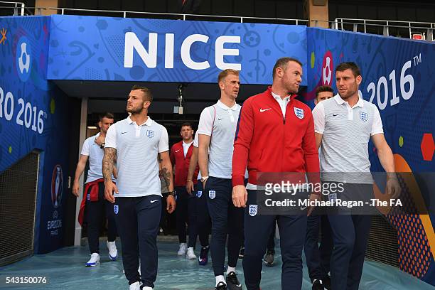 Jack Wilshere, Joe Hart, Wayne Rooney and James Milner look on as the England team inspect the pitch at the Allianz Riviera Stadium on June 26, 2016...