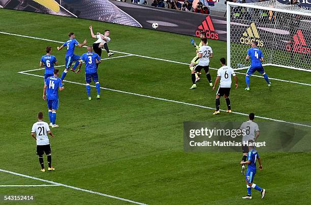 Julian Draxler of Germany scores his team's third goal during the UEFA EURO 2016 round of 16 match between Germany and Slovakia at Stade...