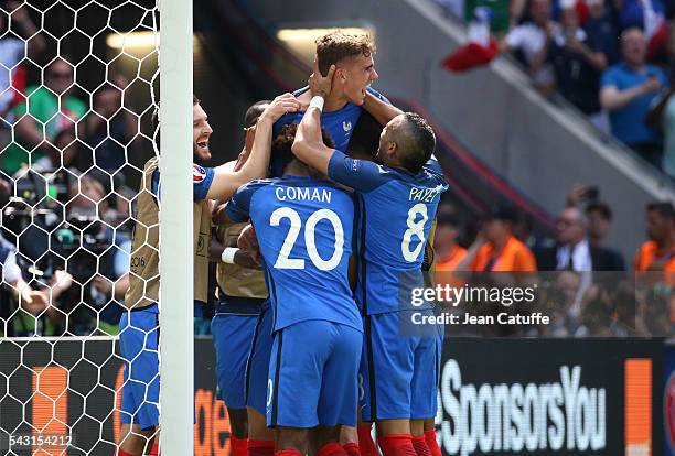 Antoine Griezmann of France celebrates his second goal with teammates during the UEFA EURO 2016 round of 16 match between France and Republic of...