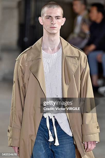 Model walks the runway during the Maison Margiela Menswear Spring/Summer 2017 show as part of Paris Fashion Week on June 24, 2016 in Paris, France.