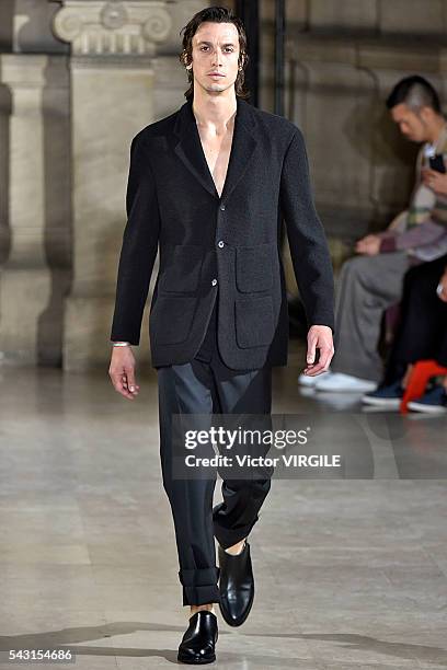 Model walks the runway during the Maison Margiela Menswear Spring/Summer 2017 show as part of Paris Fashion Week on June 24, 2016 in Paris, France.