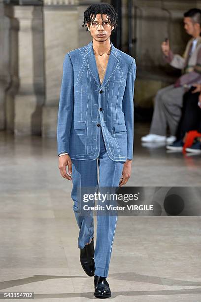 Model walks the runway during the Maison Margiela Menswear Spring/Summer 2017 show as part of Paris Fashion Week on June 24, 2016 in Paris, France.