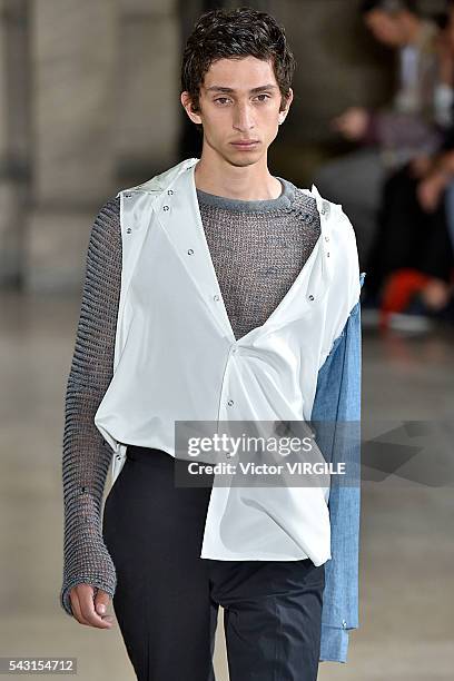 Model walks the runway during the Maison Margiela Menswear Spring/Summer 2017 show as part of Paris Fashion Week on June 24, 2016 in Paris, France.