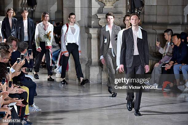 Model walks the runway during the Maison Margiela Menswear Spring/Summer 2017 show as part of Paris Fashion Week on June 24, 2016 in Paris, France.