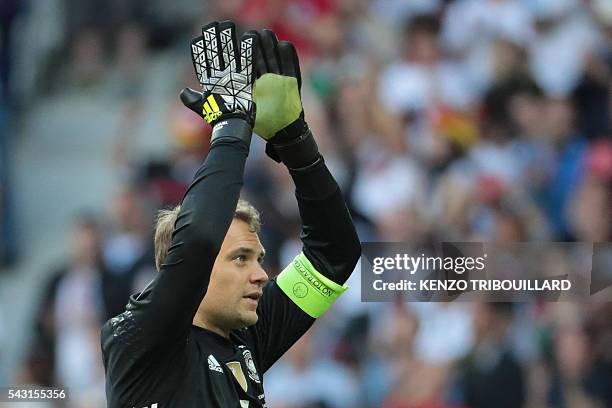 Germany's goalkeeper Manuel Neuer celebrates at the end of the Euro 2016 round of 16 football match between Germany and Slovakia at the Pierre-Mauroy...