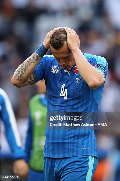 Jan Durica of Slovakia looks dejected at the end of the UEFA Euro 2016 Round of 16 match between Germany and Slovakia at Stade Pierre-Mauroy on June...