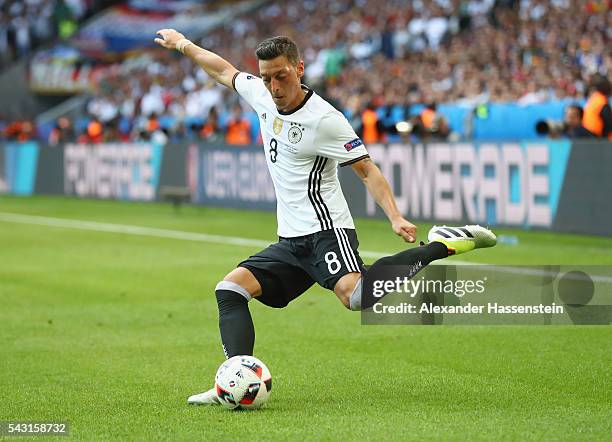 Mesut Oezil of Germany in action during the UEFA EURO 2016 round of 16 match between Germany and Slovakia at Stade Pierre-Mauroy on June 26, 2016 in...