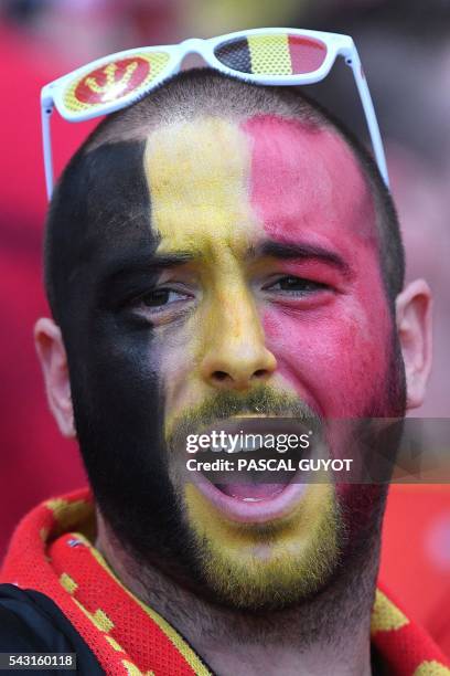 Belgium supporter cheers prior to the Euro 2016 round of 16 football match between Hungary and Belgium at the Stadium Municipal in Toulouse on June...