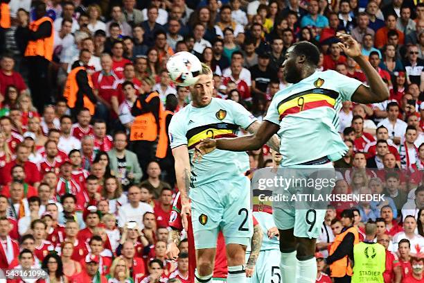 Belgium's defender Toby Alderweireld heads the ball and scores the first goal during the Euro 2016 round of 16 football match between Hungary and...