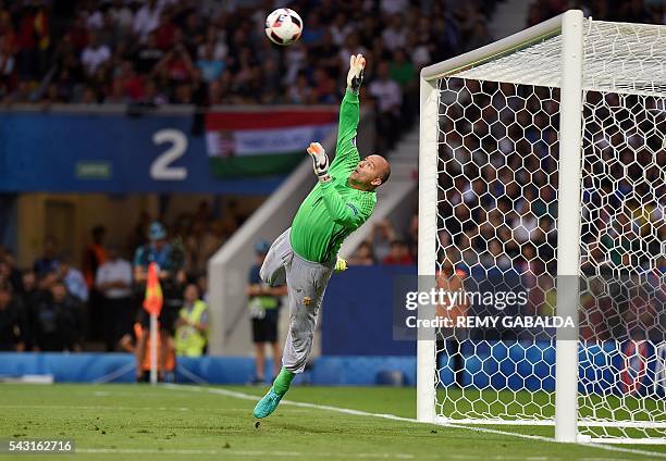 Hungary's goalkeeper Gabor Kiraly saves a shot during the Euro 2016 round of 16 football match between Hungary and Belgium at the Stadium Municipal...