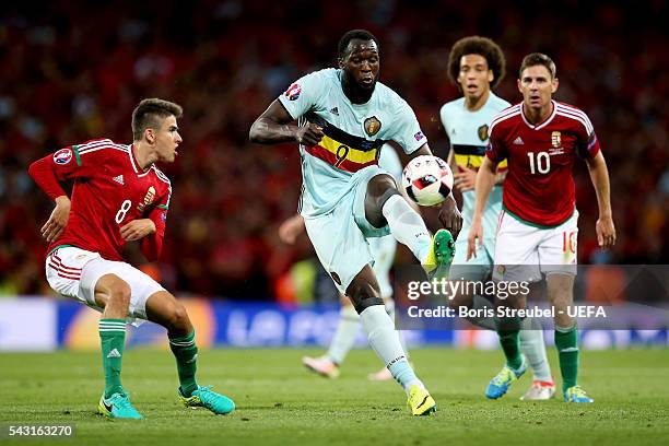 Romelu Lukaku of Belgium and Adam Nagy of Hungary compete for the ball during the UEFA EURO 2016 round of 16 match between Hungary and Belgium at...