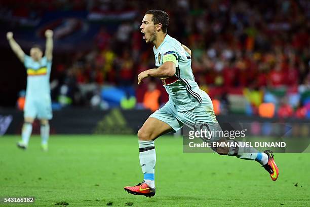 Belgium's forward Eden Hazard celebrates after scoring his team's third goal during the Euro 2016 round of 16 football match between Hungary and...