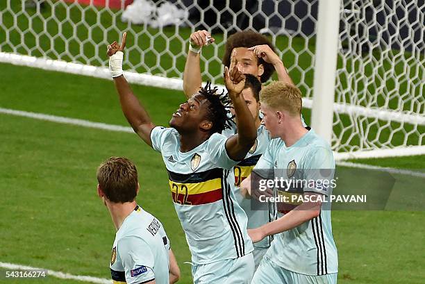 Belgium's forward Michy Batshuayi celebrates with teammates after scoring his team's second goal during the Euro 2016 round of 16 football match...