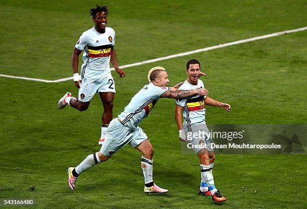 Eden Hazard of Belgium celebrates scoring his team's third goal with his team mates Michy Batshuayi and Radja Nainggolan during the UEFA EURO 2016...