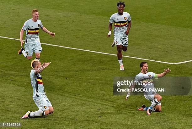 Belgium's forward Eden Hazard celebrates his goal with Belgium's midfielder Radja Nainggolan Belgium's midfielder Kevin De Bruyne and Belgium's...