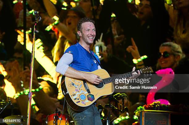 Chris Martin of Coldplay performs on the Pyramid Stage as the band headline the Glastonbury Festival 2016 at Worthy Farm, Pilton on June 25, 2016 in...