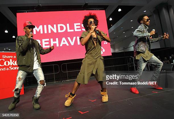 Recording artists EJ, Princeton and Craig Crippen of Mindless Behavior perform onstage at the Coke music studio during the 2016 BET Experience on...