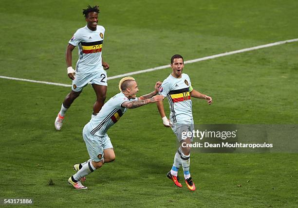 Eden Hazard of Belgium celebrates scoring his team's third goal with his team mates Michy Batshuayi and Radja Nainggolan during the UEFA EURO 2016...