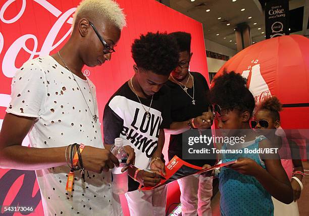 Musicians Alec Atkins, Malcolm Brickhouse and Jarad Dawkins of Unlocking the Truth attend the Coke music studio during the 2016 BET Experience on...