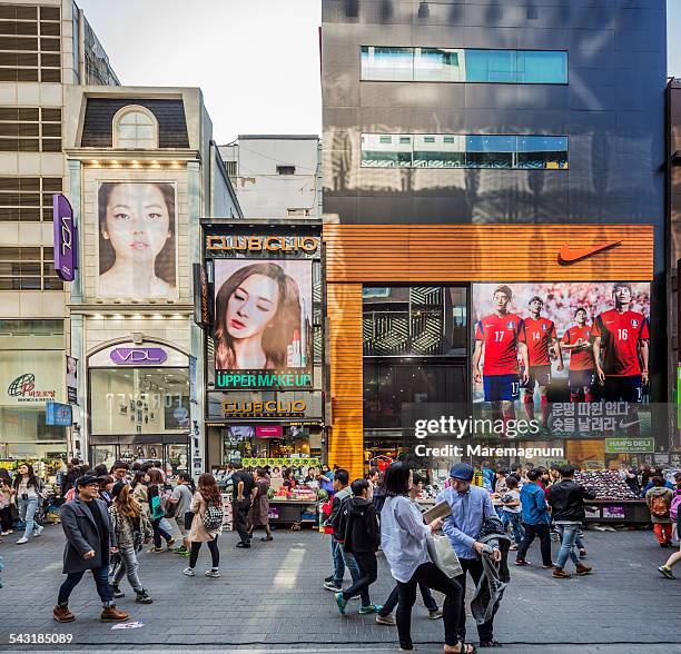 the famous shopping streets of myeong-dong - korea city stockfoto's en -beelden