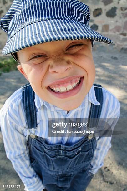 grinning boy with engineer's hat - kids costume engineer stock-fotos und bilder